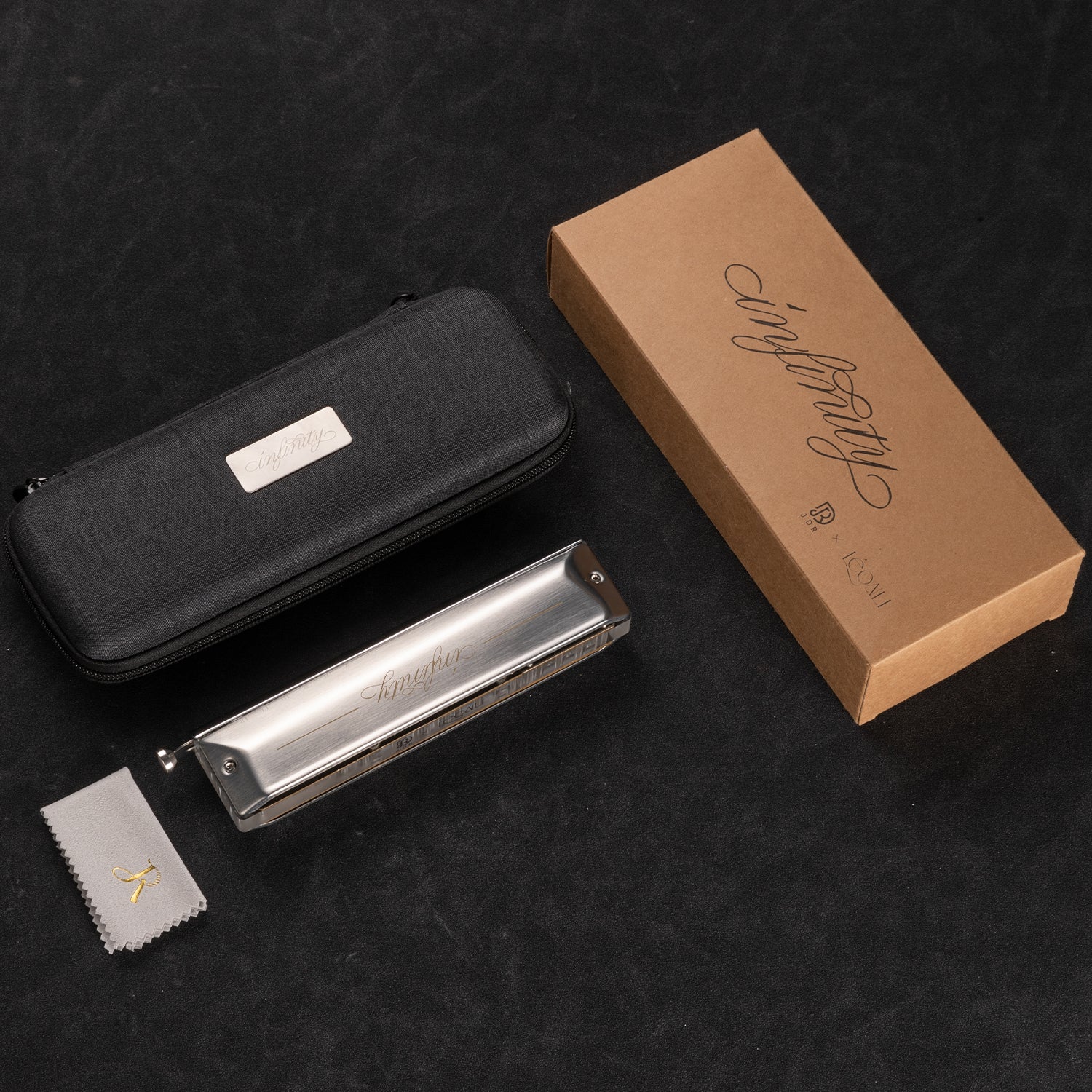 JDR Infinity Chromatic Harmonica features a copper-chrome cover, 4-thickness Infinity reedplates, No.45 reeds, and smooth blow-draw for rich, loud tones.